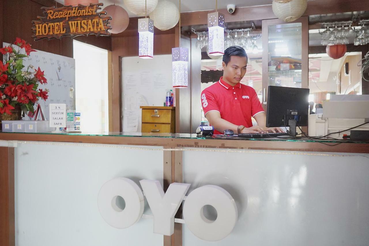 Oyo 1253 Hotel Wisata Jambi Bagian luar foto